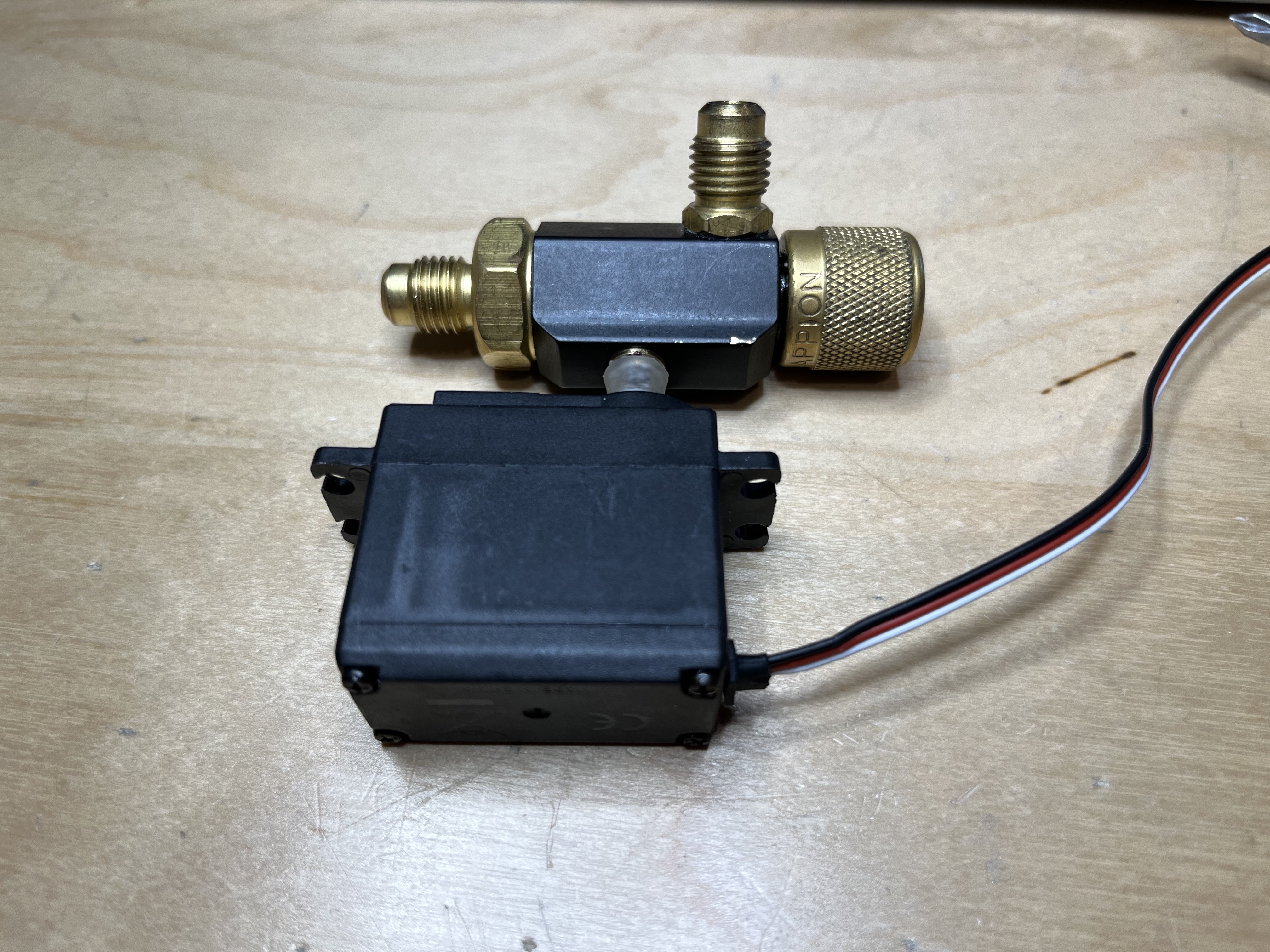 A 3D printed spline adapter allowed the servo to directly interface with the valve
