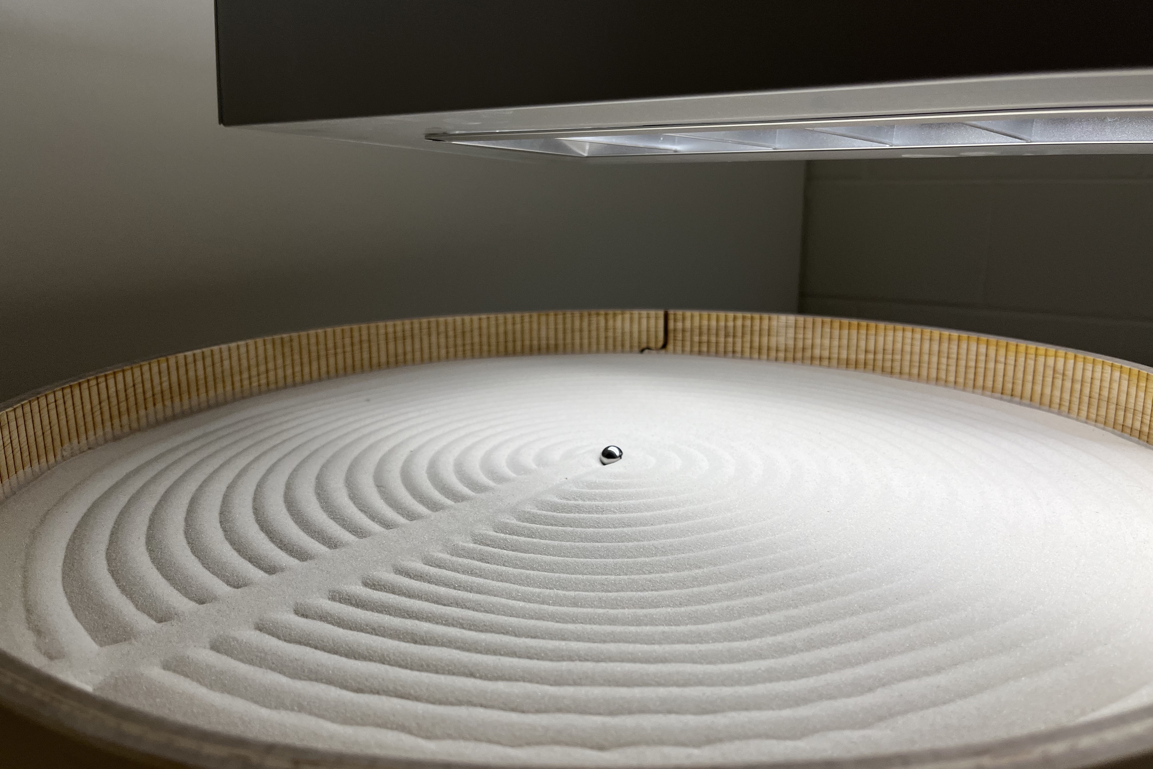 A spiral labarynth drawn in sand